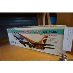 1960S BOEING 737 TIN BATTERY OPERATED TOY PLANE