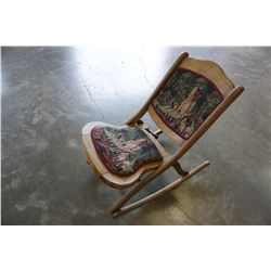 ANTIQUE ROCKING CHAIR W/ HORSE AND DOGS MOTIF CUSHION