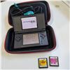 Image 2 : GUITAR HERO DS LITE W/ 2 GAMES AND CASE WORKING