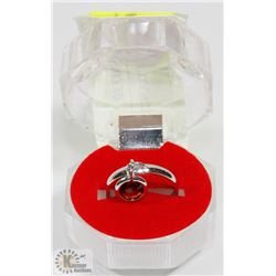 #50-RED GARNET DANGLING RING