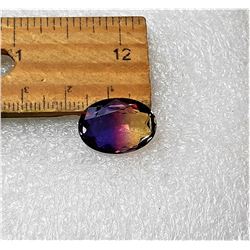 15)  NATURAL OVAL PURPLE & GOLDEN TONE