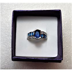 16)  SILVER TONE SETTING WITH BLUE LAB