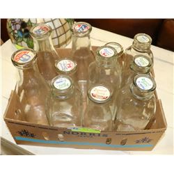 BOX OF ASSORTED MILK BOTTLES