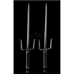 Lot # 177: Elektra Natchios' Red and Black-Handled Sais