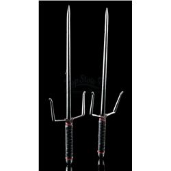 Lot # 251: Elektra Natchios' Stunt Red and Black-Handled Sais