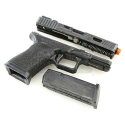 Lot # 276: Benjamin 'Dex' Poindexter's Rubber Glock Pieces