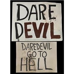 Lot # 370: 'Daredevil Go to Hell' Attack Protest Signs