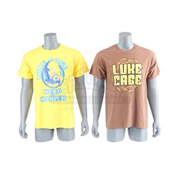 Lot # 579: D.W. Griffith's Pair of Luke Cage Novelty Shirts