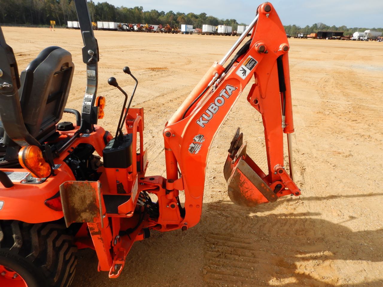 2016 KUBOTA BX25D MINI BACKHOE, VIN/SN33488 4X4, BUCKET, ROLL BAR