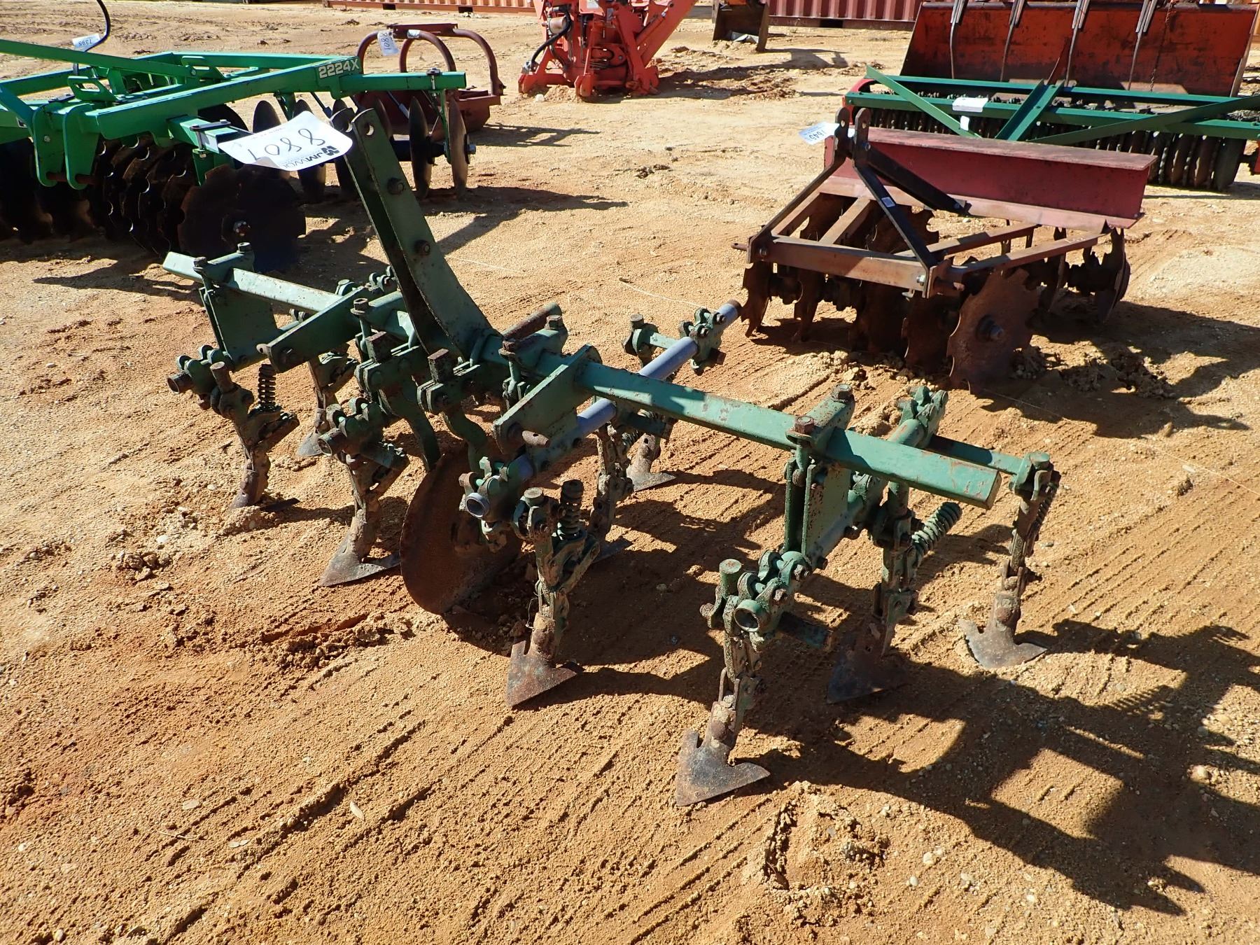 2 ROW CULTIVATOR (C3) J.M. Wood Auction Company, Inc.
