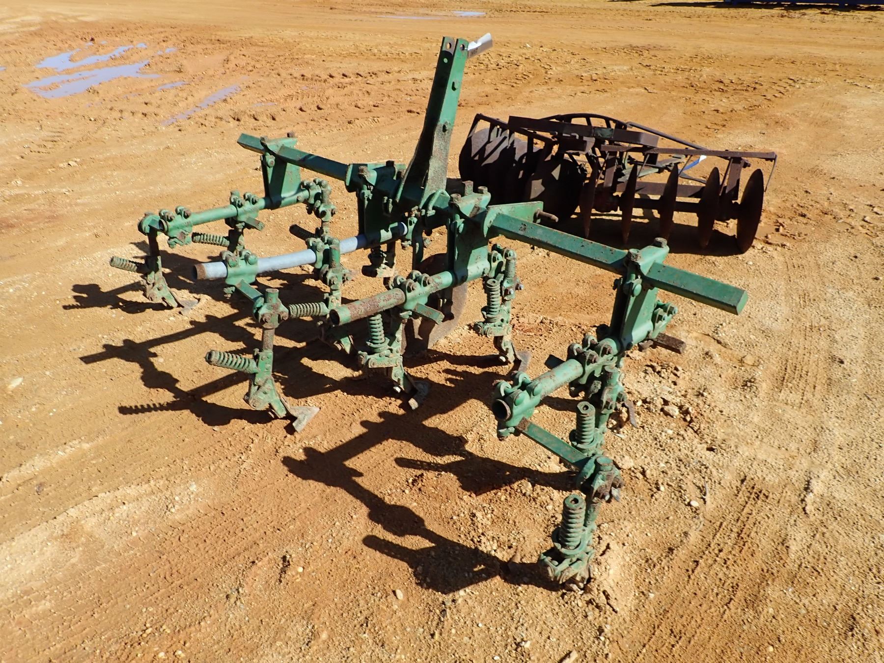 2 ROW CULTIVATOR (C3) J.M. Wood Auction Company, Inc.
