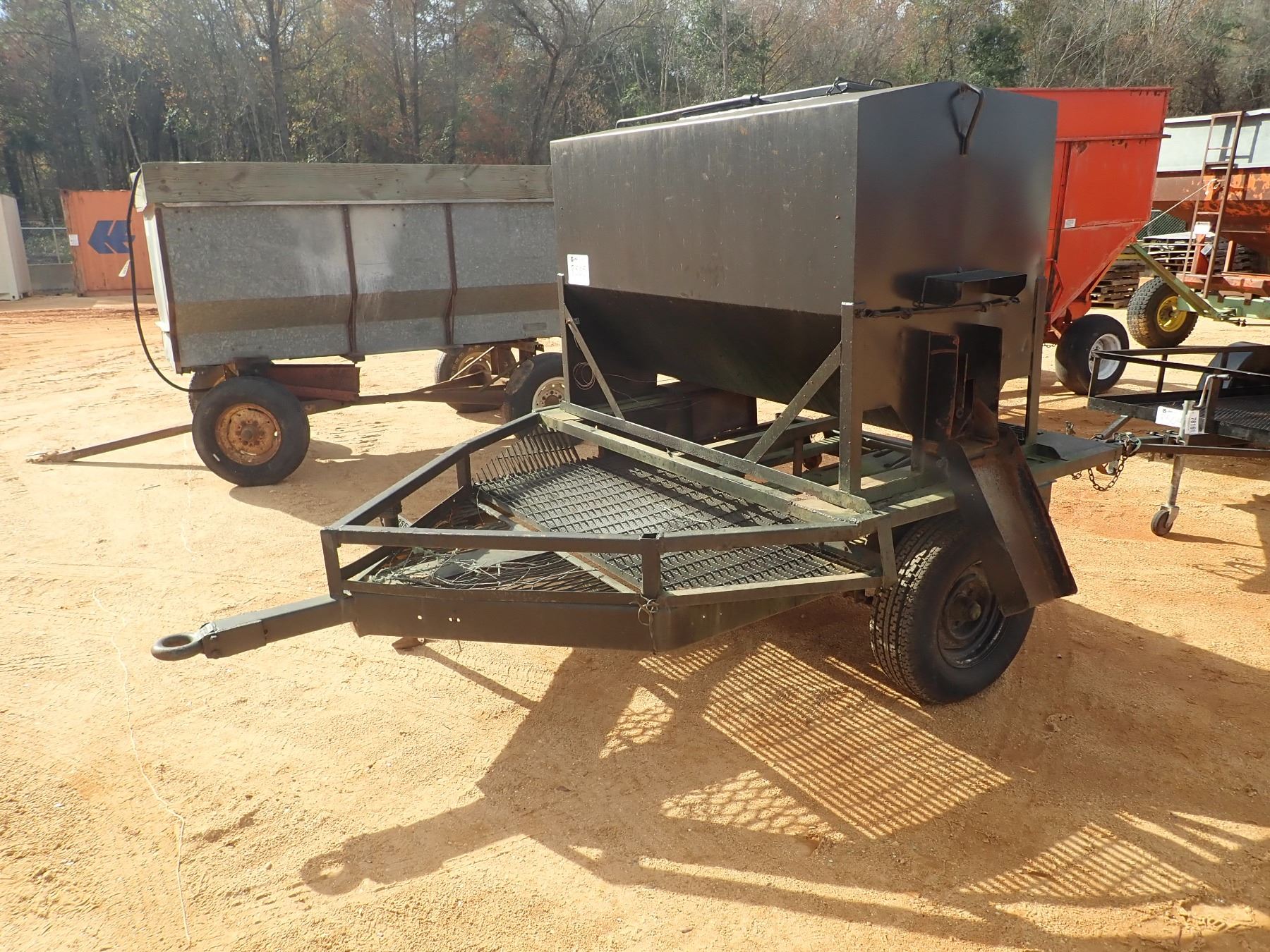 PELLET FEEDER MTD ON S/A TRAILER (C1) J.M. Wood Auction Company, Inc.