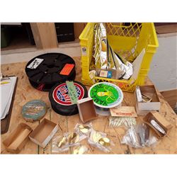 Milk crate full of fishing gear