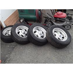 Set of 4 P235 60R15" Eagle Alloy Rims and Tires (Tires May Need Replacement)