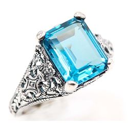 LOVELY NATURAL 4.5 CT SWISS TOPAZ RING