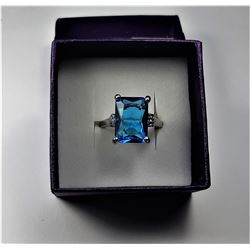 8)  EMERALD CUT AQUAMARINE RING