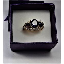 12)  TRIPLE STONE CZ AMETHYST RING SET IN