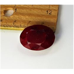 15)  BLOOD RED OVAL 47.5 CT RUBY