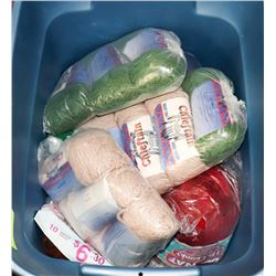 PLASTIC BIN FULL OF NEW YARN IN VARIOUS COLOURS