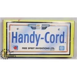 HANDYCORD EXTENSION CORD HOLDER.