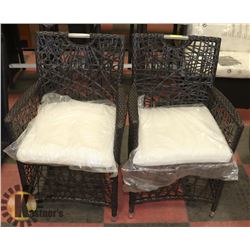 9) RATTAN STYLE PAIR OF ARM CHAIRS.