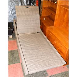 24) RATTAN STYLE LIGHT BROWN LOUNGE CHAIR.