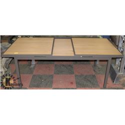 21) RATTAN STYLE WOOD & METAL PATIO TABLE.