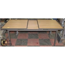 21) RATTAN STYLE WOOD & METAL PATIO TABLE.