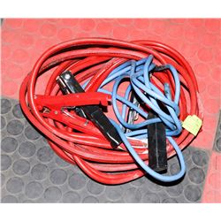 SET OF BOOSTER CABLES AND EXTENSION CORD.