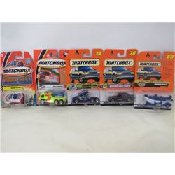LOT OF 5 MATCHBOX VEHICLES (RAPIDS RAFT, BADGE BLASTER, MERCEDES BENZ E CLASS, FIRE FLOODER, KENWORT
