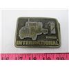 Image 2 : LOT OF 3 COLLECTIBLES (BRASS DOOR KNOCKER, INTERNATIONAL TRUCKS BELT BUCKLE, IGNITION W/KEYS)