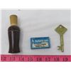 Image 1 : LOT OF 3 COLLECTIBLES (GOOSE CALL, SKELETON KEY AND BUTANE LIGHTER REFILL)