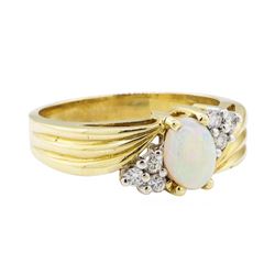 0.50 ctw Opal and Diamond Ring - 14KT Yellow Gold