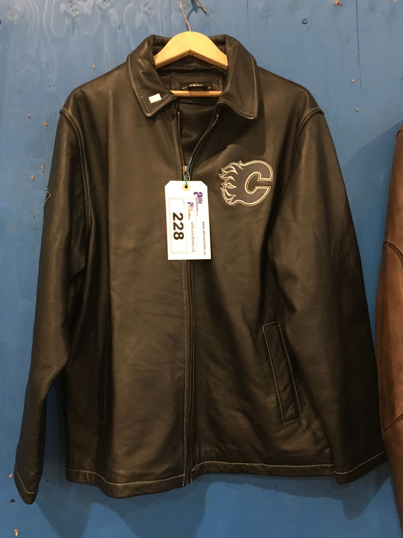 RBK CALGARY FLAMES BLACK LEATHER JACKET (SIZE M) - Able Auctions