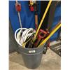 Image 1 : 2 GREY RUBBERMAID GARBAGE CANS & ASSTD GARDEN TOOLS, GARDEN HOSE, AXE, SAW, MACHETE ECT.