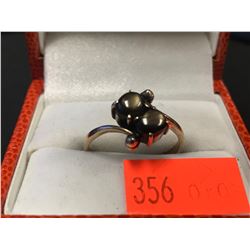 STAMPED 14K OPAQUE BLACK STONE RING (AUTHENTICITY NOT VERIFIED / POLICE RECOVERY)