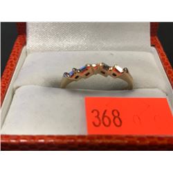 STAMPED 14K FOUR DIAMOND RING (AUTHENTICITY NOT VERIFIED / POLICE RECOVERY)