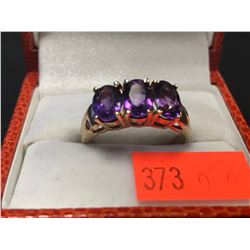 STAMPED 10K PURPLE STONE RING (AUTHENTICITY NOT VERIFIED / POLICE RECOVERY)