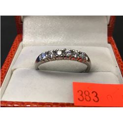 STAMPED 10K/CZ RING (AUTHENTICITY NOT VERIFIED / POLICE RECOVERY)