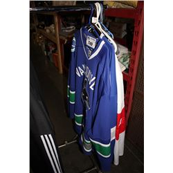 3 HOCKEY JERSEYS AND PAIR OF HOCKEY SCARVES