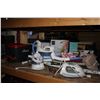 Image 2 : LARGE SHELF OF HOME ITEMS INCLUDING IRONS, IRON BOARD, STEAMER, MOP BUCKET AND LARGE COFFEE CUP