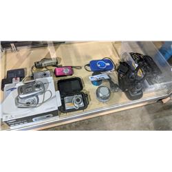 LARGE LOT OF ELECTRONICS INCLUDING DIGITAL CAMERAS, SPEAKERS, BATTERY, WALKIE TALKIES AND MORE