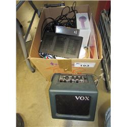 BOX OF ASSORTED ELECTRONICS & MISC (VOX SPEAKER, HEADPHONES, INTERNET MODEM, DVD PLAYERS, DVDS,