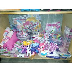 SHELF OF PARTY SUPPLIES INCLUDING MY LITTLE PONY CUPS, PLATES, DECOR AND MY LITTLE PONIES