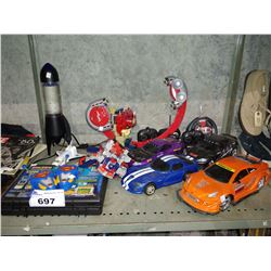 SHELF INCLUDING RC CARS, TRANSFORMERS AND MORE