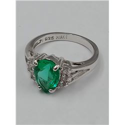 .925 STERLING SILVER DESIGNER RING WITH GREEN STONE