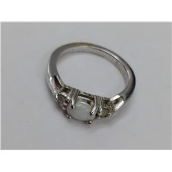 STERLING SILVER DESIGNER RING WITH WHITE STONE