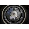 Image 2 : 4 MICHELIN P205/70R15 TIRES WITH CADILLAC RIMS