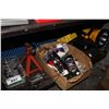 Image 2 : SHELF OF ASSORTED TOOLS INCLUDING TOW HOOK, JUMPER CABLES, GREASE GUN, JACK, TIRE AND MORE