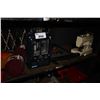 Image 2 : SHELF OF ASSORTED TOOLS INCLUDING SAW, FLASHLIGHT, TOOLS BOX, CLAMPS, HEATER, SEWING MACHINE, AND